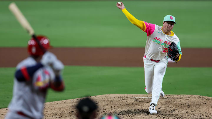 Aug 1, 2025; San Diego, California, USA; San Diego Padres pitcher Mason Miller (22) pitches during the eighth inning against the St. Louis Cardinals at Petco Park. Mandatory Credit: Chadd Cady-Imagn Images
