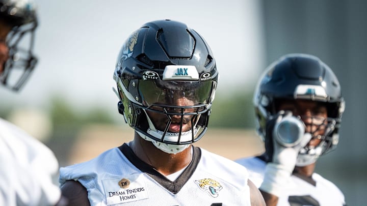 Jacksonville Jaguars defensive end Josh Hines-Allen (41) talks to a teammate while runing through drills during the seventh organized team activity at the Miller Electric Center in Jacksonville, Fla. Monday, June 2, 2025. [Doug Engle/Florida Times-Union]