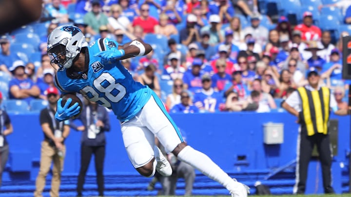 Aug 24, 2024; Orchard Park, New York, USA; Carolina Panthers wide receiver Terrace Marshall Jr. (88) runs with the ball after making a catch and scores a touchdown against the Buffalo Bills during the second half at Highmark Stadium. Mandatory Credit: Gregory Fisher-Imagn Images