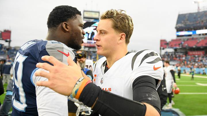 Dec 15, 2024; Nashville, Tennessee, USA; Cincinnati Bengals quarterback Joe Burrow (9) and Tennessee Titans defensive tackle Jeffery Simmons (98) during the second half at Nissan Stadium. Mandatory Credit: Steve Roberts-Imagn Images Dec 15, 2024; Nashville, Tennessee, USA; Cincinnati Bengals quarterback Joe Burrow (9) and Tennessee Titans defensive tackle Jeffery Simmons (98) during the second half at Nissan Stadium. Mandatory Credit: Steve Roberts-Imagn Images