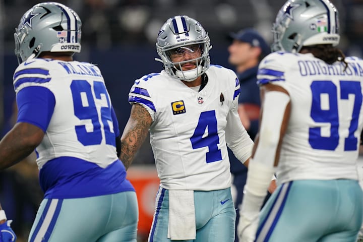 Dallas Cowboys quarterback Dak Prescott warms up before a game against the Minnesota Vikings at AT&T Stadium.