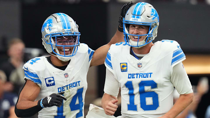 Detroit Lions receiver Amon-Ra St. Brown (14) and quarterback Jared Goff (16). Detroit Lions receiver Amon-Ra St. Brown (14) and quarterback Jared Goff (16).