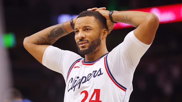 Jan 6, 2025; Minneapolis, Minnesota, USA; Los Angeles Clippers guard Norman Powell (24) reacts as time ends and his team loses to the Minnesota Timberwolves at Target Center. 