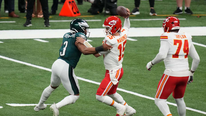 Feb 9, 2025; New Orleans, LA, USA; Philadelphia Eagles linebacker Nolan Smith Jr. (3) makes a tackle on Kansas City Chiefs quarterback Patrick Mahomes (15) during the second quarter in Super Bowl LIX at Caesars Superdome. Mandatory Credit: Kirby Lee-Imagn Images