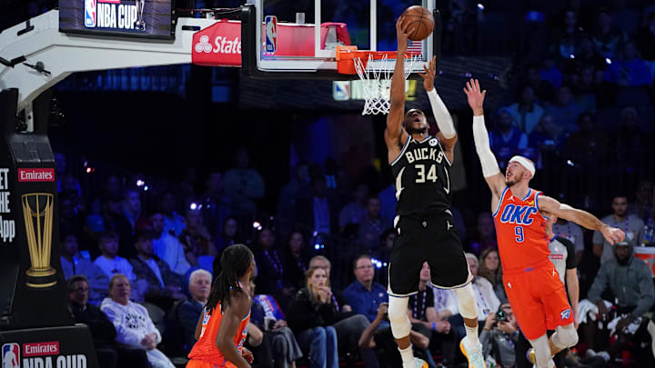 Dec 17, 2024; Las Vegas, Nevada, USA; Milwaukee Bucks forward Giannis Antetokounmpo (34) shoots against Oklahoma City Thunder guard Alex Caruso (9) during the 2nd quarter of the Emirates NBA Cup championship game at T-Mobile Arena. Mandatory Credit: Kyle Terada-Imagn Images