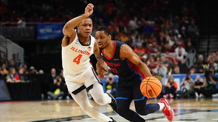 Mar 23, 2024; Omaha, NE, USA; Duquesne Dukes forward Andy Barba (22) dribbles the ball against