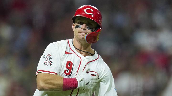 Cincinnati Reds second baseman Matt McLain (9) hits a solo home run