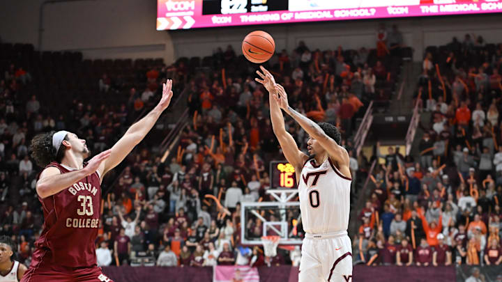 Mar 3, 2026; Blacksburg, Va.; Virginia Tech guard Jailen Bedford (0) shoots a shot as Boston College center Boden Kapke (33) defends during the second half.