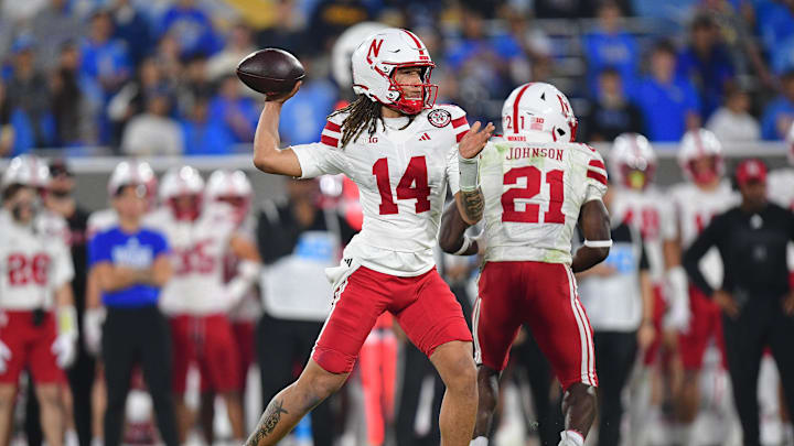 Nov 8, 2025; Pasadena, California, USA; Nebraska Cornhuskers quarterback TJ Lateef (14) throws against the UCLA Bruins during the first half at the Rose Bowl.