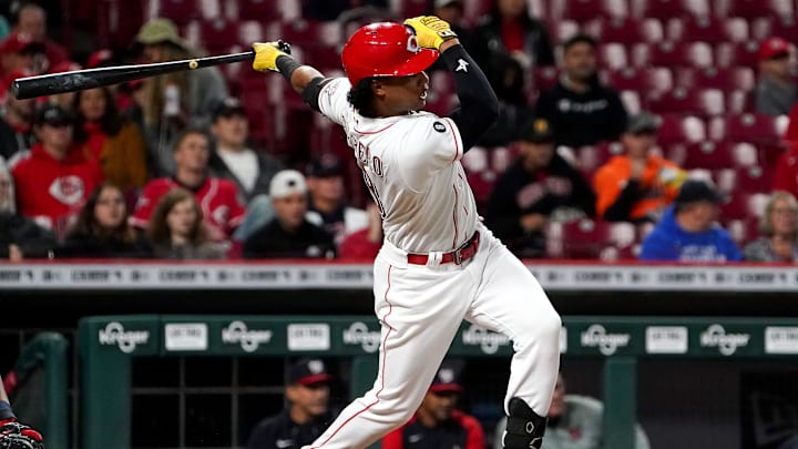 Cincinnati Reds center fielder Jose Barrero (38) hits a single.
