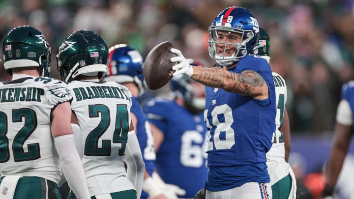 Jan 7, 2024; East Rutherford, New Jersey, USA; New York Giants wide receiver Isaiah Hodgins (18) reacts after first down during the first quarter against the Philadelphia Eagles at MetLife Stadium. Mandatory Credit: Vincent Carchietta-USA TODAY Sports Jan 7, 2024; East Rutherford, New Jersey, USA; New York Giants wide receiver Isaiah Hodgins (18) reacts after first down during the first quarter against the Philadelphia Eagles at MetLife Stadium. Mandatory Credit: Vincent Carchietta-USA TODAY Sports