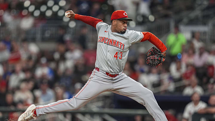 Sep 9, 2024; Cumberland, Georgia, USA; Cincinnati Reds relief pitcher Alexis Diaz (43) pitches against the Atlanta Braves during the ninth inning at Truist Park. Mandatory Credit: Dale Zanine-Imagn Images