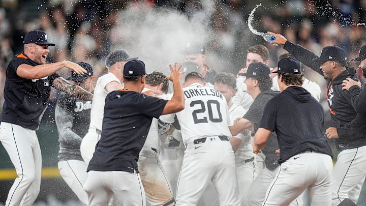 Detroit Tigers players celebrate a walk-off single against the Boston Red Sox.