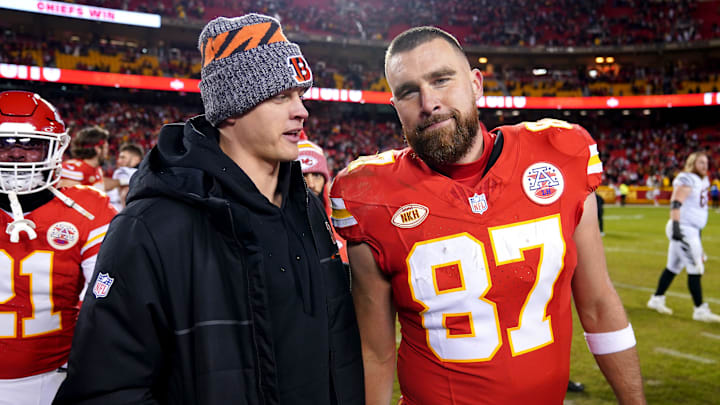 Cincinnati Bengals quarterback Joe Burrow (9), left, talks with Kansas City Chiefs tight end Travis Kelce (87) at the conclusion of a Week 17 NFL football game between the Cincinnati Bengals and the Kansas City Chiefs, Sunday, Dec. 31, 2023, at GEHA Field at Arrowhead Stadium in Kansas City, Mo. The Kansas City Chiefs won, 25-17.