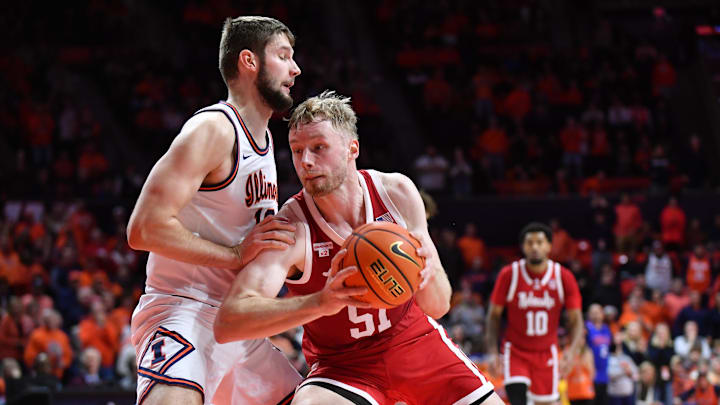 Nebraska forward Rienk Mast drives against Illinois center Tomislav Ivisic during the second half at State Farm Center.