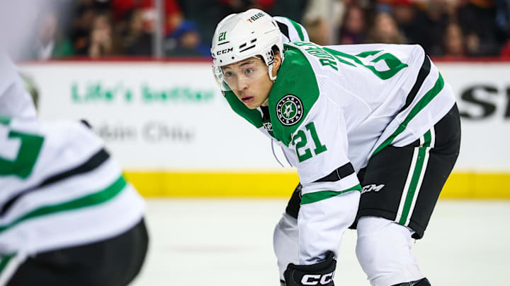 Mar 27, 2025; Calgary, Alberta, CAN; Dallas Stars left wing Jason Robertson (21) against the Calgary Flames during the third period at Scotiabank Saddledome. Mandatory Credit: Sergei Belski-Imagn Images