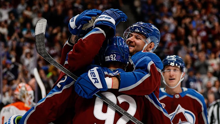 Nov 11, 2025; Denver, Colorado, USA; Colorado Avalanche left wing Gabriel Landeskog (92) celebrates his goal with right wing Valeri Nichushkin (13) in the second period against the Anaheim Ducks at Ball Arena. Mandatory Credit: Isaiah J. Downing-Imagn Images