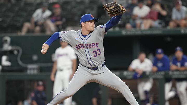 Mets relief pitcher Drew Smith (33) delivers a pitch to the Texas Rangers during the ninth inning at Globe Life Field. Mets relief pitcher Drew Smith (33) delivers a pitch to the Texas Rangers during the ninth inning at Globe Life Field.