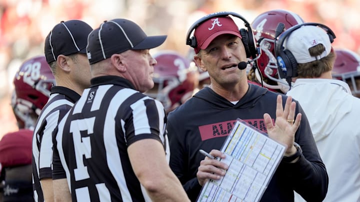 Nov 16, 2024; Tuscaloosa, AL, USA; Alabama Crimson Tide head coach Kalen DeBoer talks with officials during a review during the game against the Mercer Bears at Bryant-Denny Stadium. Mandatory Credit: Gary Cosby Jr.-Imagn Images