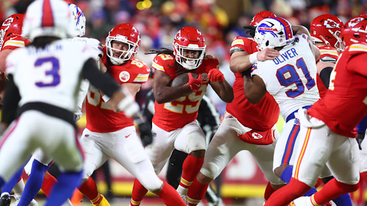 Jan 26, 2025; Kansas City, MO, USA; Kansas City Chiefs running back Kareem Hunt (29) rushes the ball against the Buffalo Bills during the first half in the AFC Championship game at GEHA Field at Arrowhead Stadium. Mandatory Credit: Mark J. Rebilas-Imagn Images