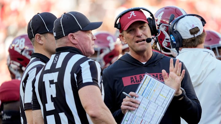 Nov 16, 2024; Tuscaloosa, AL, USA; Alabama Crimson Tide head coach Kalen DeBoer talks with officials during a review at Bryant-Denny Stadium. Alabama defeated Mercer 52-7. Mandatory Credit: Gary Cosby Jr.-Tuscaloosa News