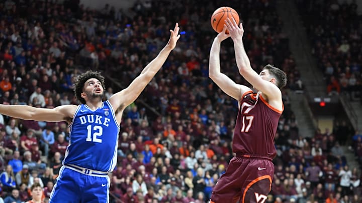 Jan 31, 2026; Blacksburg, Virginia, USA;  Virginia Tech Hokies guard Neoklis Avdalas (17) shoots a shot defended by Duke Blue Devils forward Cameron Boozer (12) during the second half at Cassell Coliseum. Mandatory Credit: Brian Bishop-Imagn Images