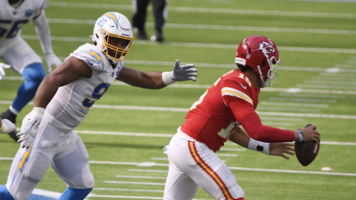 Sep 20, 2020; Inglewood, California, USA; Kansas City Chiefs quarterback Patrick Mahomes (15) is pressured by Los Angeles Chargers defensive tackle Jerry Tillery (99) during the third quarter at SoFi Stadium. Mandatory Credit: Robert Hanashiro-Imagn Images Sep 20, 2020; Inglewood, California, USA; Kansas City Chiefs quarterback Patrick Mahomes (15) is pressured by Los Angeles Chargers defensive tackle Jerry Tillery (99) during the third quarter at SoFi Stadium. Mandatory Credit: Robert Hanashiro-Imagn Images