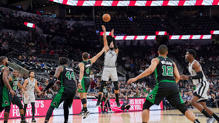 Nov 9, 2019; San Antonio, TX, USA; San Antonio Spurs guard Marco Belinelli (18) shoots over Boston Celtics guard Carsen Edwards (4) during the second half at the AT&T Center. Mandatory Credit: Daniel Dunn-Imagn Images