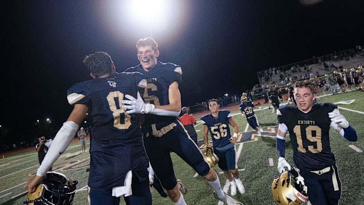Sep 19, 2025; Old Tappan, NJ, USA; Ramapo football at Old Tappan. OT #6 Anthony Miceli celebrates with his team after defeating Ramapo.