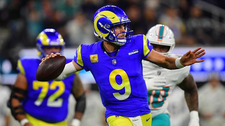 Nov 11, 2024; Inglewood, California, USA; Los Angeles Rams quarterback Matthew Stafford (9) throws against the Miami Dolphins during the first half at SoFi Stadium. Mandatory Credit: Gary A. Vasquez-Imagn Images