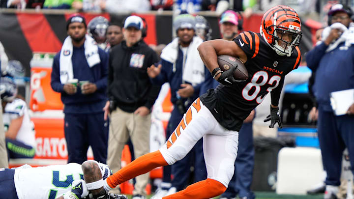 Cincinnati Bengals wide receiver Tyler Boyd (83) is pulled down by the Seahawks defense their game