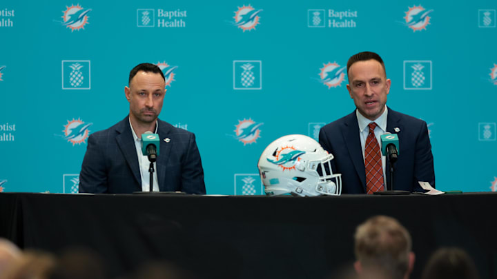Miami Dolphins head coach Jeff Hafley, right, joined by general manager Jon-Eric Sullivan, left, speak to reporters during their introductory press conference at Baptist Health Training Complex. 