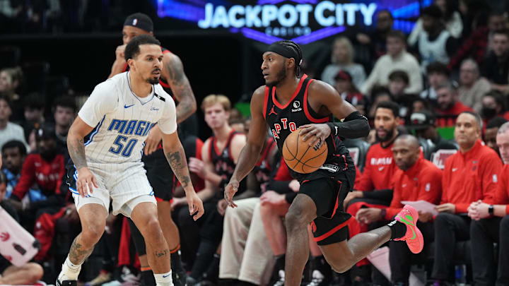 Jan 3, 2025; Toronto, Ontario, CAN: Toronto Raptors guard Immanuel Quickley (5) dribbles against Orlando Magic guard Cole Anthony (50) during the second quarter at Scotiabank Arena.. Mandatory Credit: Nick Turchiaro-Imagn Images Jan 3, 2025; Toronto, Ontario, CAN: Toronto Raptors guard Immanuel Quickley (5) dribbles against Orlando Magic guard Cole Anthony (50) during the second quarter at Scotiabank Arena.. Mandatory Credit: Nick Turchiaro-Imagn Images