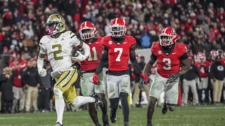Nov 29, 2024; Athens, Georgia, USA; Georgia Tech Yellow Jackets wide receiver Eric Singleton Jr. (2) scores a touchdown against the Georgia Bulldogs during overtime at Sanford Stadium. Mandatory Credit: Dale Zanine-Imagn Images
