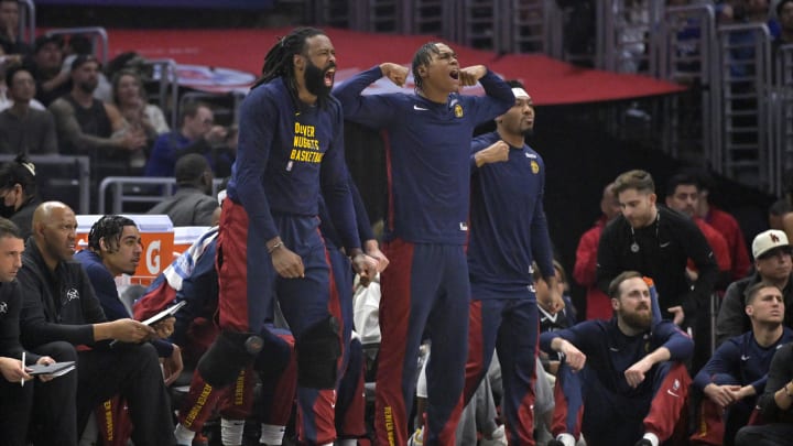 Apr 4, 2024; Los Angeles, California, USA;  Denver Nuggets center DeAndre Jordan (6) and forward Peyton Watson (8) react after a basket in the first half against the Los Angeles Clippers at Crypto.com Arena. Mandatory Credit: Jayne Kamin-Oncea-USA TODAY Sports