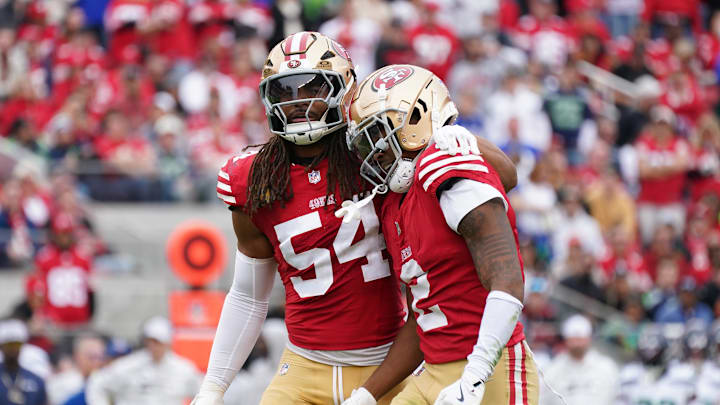 San Francisco 49ers linebacker Fred Warner (54) calms down San Francisco 49ers cornerback Deommodore Lenoir (2) after offsetting penalties against the Seattle Seahawks in the second quarter at Levi's Stadium. Mandatory Credit: David Gonzales-Imagn Images