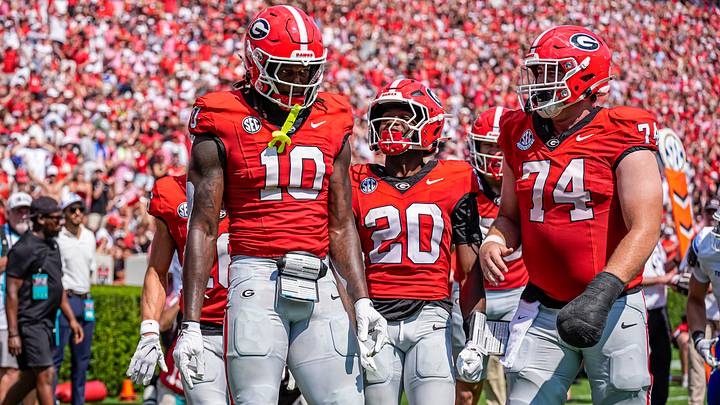 Georgia Football players celebrate against Tennessee State. Georgia Football players celebrate against Tennessee State.