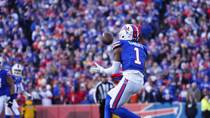 Jan 12, 2025; Orchard Park, New York, USA; Buffalo Bills wide receiver Curtis Samuel (1) catches a pass during the fourth quarter against the Denver Broncos in an AFC wild card game at Highmark Stadium. Mandatory Credit: Gregory Fisher-Imagn Images