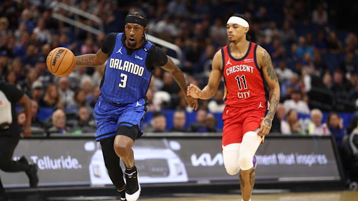 Orlando Magic guard Kentavious Caldwell-Pope (3) dribbles past New Orleans Pelicans guard Brandon Boston Jr. (11) in the first quarter at Kia Center. 