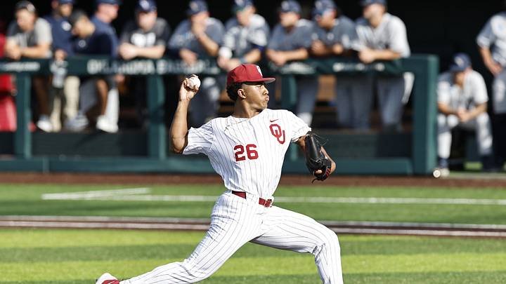 May 31, 2024; Norman, OK, USA; Oklahoma Sooners pitcher Kyson Witherspoon (26) throws a pitch during the first inning of an NCAA Division I Baseball Championship game between the Oral Roberts Golden Eagles and the Oklahoma Sooners at L. Dale Mitchell Park. Credit: Alonzo Adams-Imagn Images