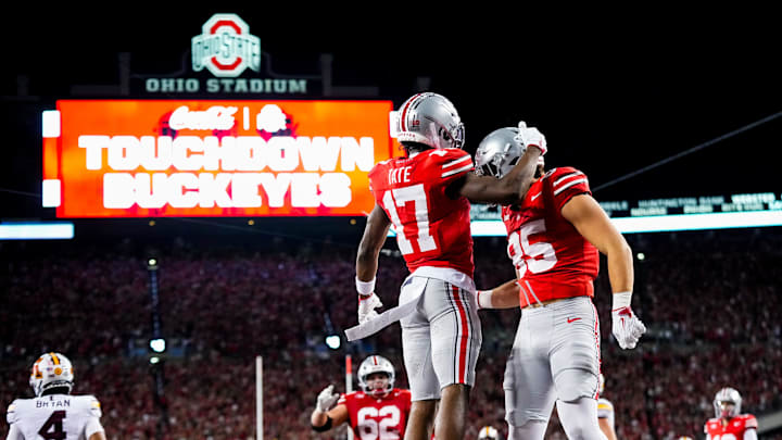 Ohio State Buckeyes wide receiver Carnell Tate (17) celebrates with tight end Bennett Christian (85) after Tate scored a touchdown in the second half of the NCAA football game at Ohio Stadium on Saturday, Oct. 4, 2025 in Columbus, Ohio.