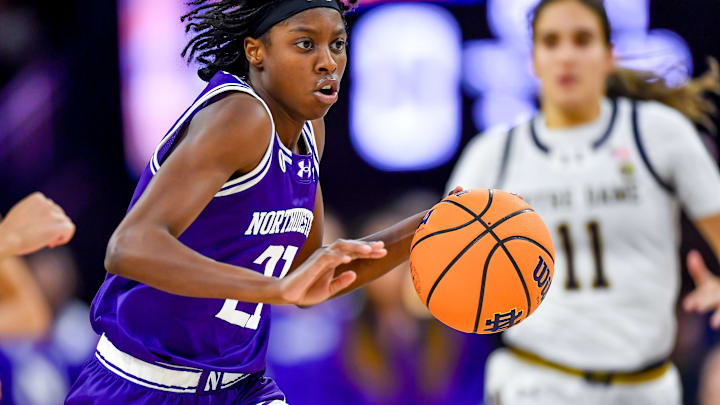 Nov 15, 2023; South Bend, Indiana, USA; Northwestern Wildcats guard Melannie Daley (21) drives to the basket in the first half against the Notre Dame Fighting Irish at the Purcell Pavilion. Mandatory Credit: Matt Cashore-Imagn Images Nov 15, 2023; South Bend, Indiana, USA; Northwestern Wildcats guard Melannie Daley (21) drives to the basket in the first half against the Notre Dame Fighting Irish at the Purcell Pavilion. Mandatory Credit: Matt Cashore-Imagn Images