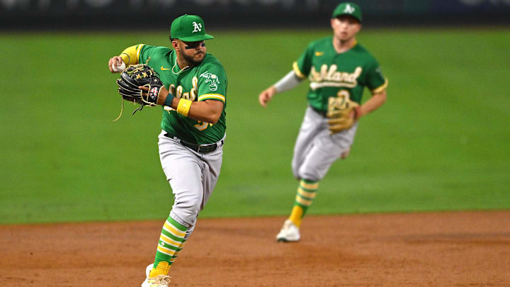 Sep 29, 2022; Anaheim, California, USA;  Oakland Athletics second baseman Vimael Machin (31) makes a play for an out in the second inning against the Los Angeles Angels at Angel Stadium. Mandatory Credit: Jayne Kamin-Oncea-Imagn Images