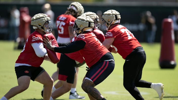 Jun 11, 2025; Santa Clara, CA, USA; San Francisco 49ers offensive linemen work on blocking skills during a team OTA at Levi's Stadium. Mandatory Credit: D. Ross Cameron-Imagn Images Jun 11, 2025; Santa Clara, CA, USA; San Francisco 49ers offensive linemen work on blocking skills during a team OTA at Levi's Stadium. Mandatory Credit: D. Ross Cameron-Imagn Images