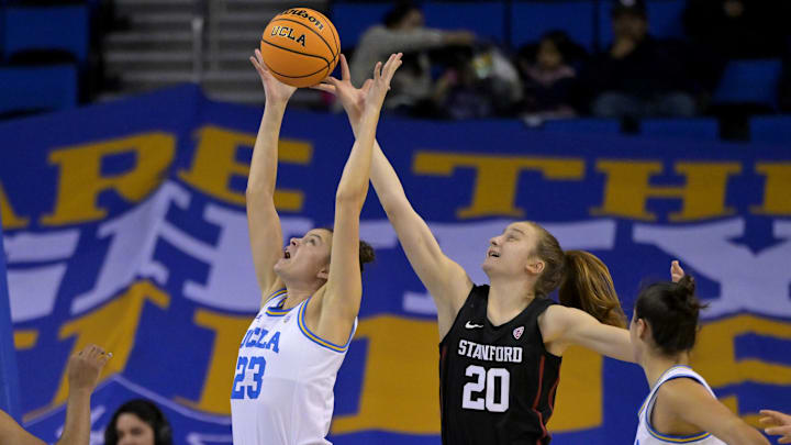 Jan 13, 2023; Los Angeles, California, USA; UCLA Bruins forward Gabriela Jaquez (23) beats Stanford Cardinal guard Elena Bosgana (20) to a rebound in the first half at Pauley Pavilion presented by Wescom. Mandatory Credit: Jayne Kamin-Oncea-Imagn Images Jan 13, 2023; Los Angeles, California, USA; UCLA Bruins forward Gabriela Jaquez (23) beats Stanford Cardinal guard Elena Bosgana (20) to a rebound in the first half at Pauley Pavilion presented by Wescom. Mandatory Credit: Jayne Kamin-Oncea-Imagn Images
