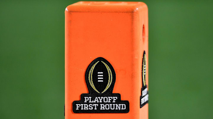 Dec 20, 2024; Notre Dame, Indiana, USA; A logo for the College Football Playoff First Round on a pylon during the first quarter between the Indiana Hoosiers and Notre Dame Fighting Irish at Notre Dame Stadium. Mandatory Credit: Matt Cashore-Imagn Images Dec 20, 2024; Notre Dame, Indiana, USA; A logo for the College Football Playoff First Round on a pylon during the first quarter between the Indiana Hoosiers and Notre Dame Fighting Irish at Notre Dame Stadium. Mandatory Credit: Matt Cashore-Imagn Images