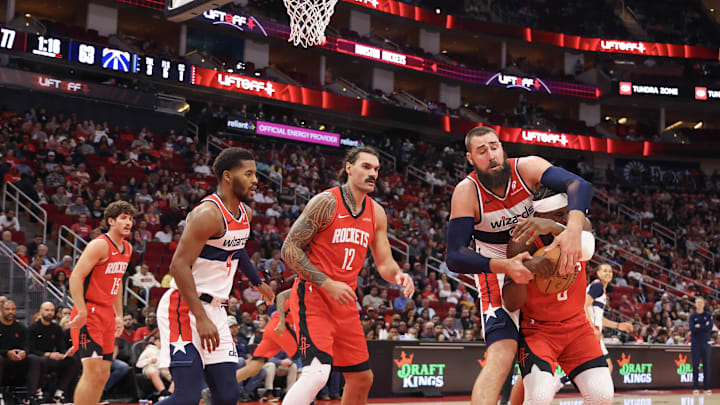 Nov 11, 2024; Houston, Texas, USA; Houston Rockets forward Jae'Sean Tate (8) and Washington Wizards center Jonas Valanciunas (17) fight for a rebound in the second half at Toyota Center. Mandatory Credit: Thomas Shea-Imagn Images Nov 11, 2024; Houston, Texas, USA; Houston Rockets forward Jae'Sean Tate (8) and Washington Wizards center Jonas Valanciunas (17) fight for a rebound in the second half at Toyota Center. Mandatory Credit: Thomas Shea-Imagn Images