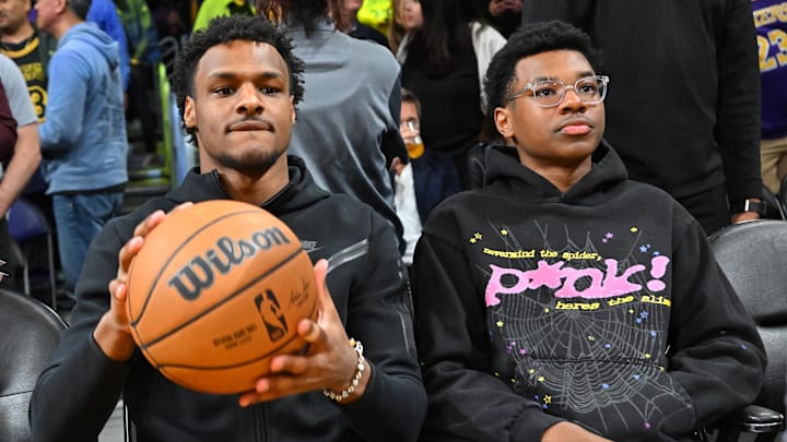 Los Angeles Lakers forward LeBron James (6) sons Bronny and Bryce James attend a game against the Milwaukee Bucks at Crypto.com Arena.
