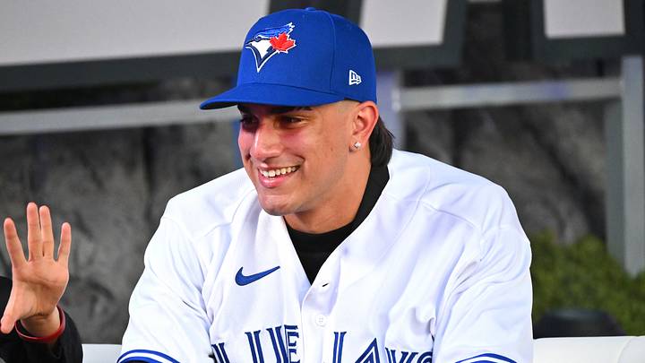 Jul 17, 2022; Los Angeles, CA, USA;  Brandon Barriera reacts after he was selected by the Toronto Blue Jays as the 23th player in the MLB draft at XBox Plaza at LA Live. Mandatory Credit: Jayne Kamin-Oncea-USA TODAY Sports