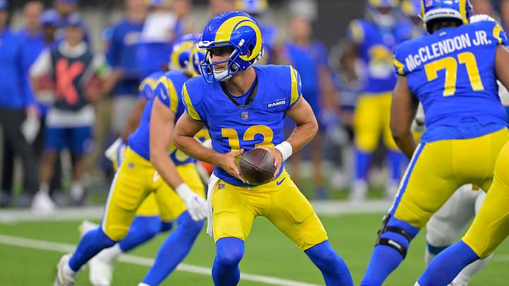 Aug 12, 2023; Inglewood, California, USA; Los Angeles Rams quarterback Stetson Bennett (13) gets set in the pocket in the first half against the Los Angeles Chargers at SoFi Stadium. Mandatory Credit: Jayne Kamin-Oncea-USA TODAY Sports Aug 12, 2023; Inglewood, California, USA; Los Angeles Rams quarterback Stetson Bennett (13) gets set in the pocket in the first half against the Los Angeles Chargers at SoFi Stadium. Mandatory Credit: Jayne Kamin-Oncea-USA TODAY Sports